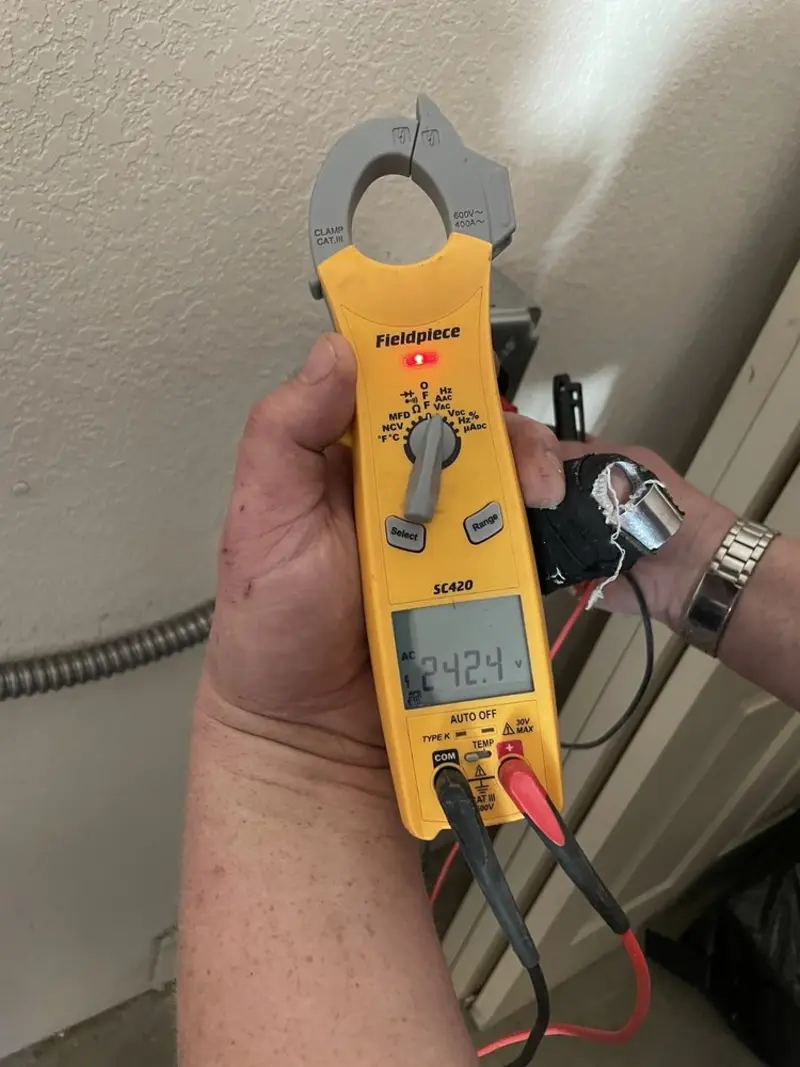 Voltage testing with clamp meter during Hot Tub / Pool Electrical Wiring in Ridgefield
